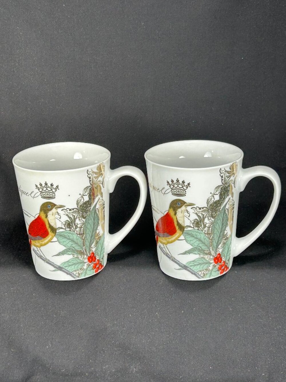 Pair of colorful coffee mugs. ppd AM HAMBUCH